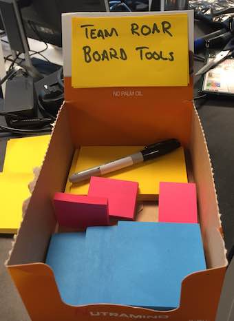 Box with tools, and only the 'correct' coloured stickies